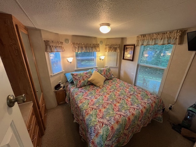 2795 East 28th Road Marseilles, IL 61341 - Photo 19 of 79 a bedroom with a bed and a mirror