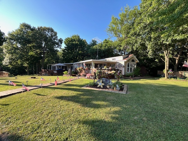 2795 East 28th Road Marseilles, IL 61341 - Photo 2 of 79 a view of swimming pool with sitting area and garden