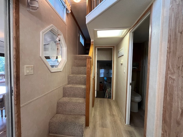 2795 East 28th Road Marseilles, IL 61341 - Photo 25 of 79 a view of a hallway with entryway wooden floor and front door