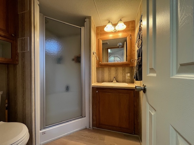 2795 East 28th Road Marseilles, IL 61341 - Photo 28 of 79 a bathroom with a sink and mirror with toilet