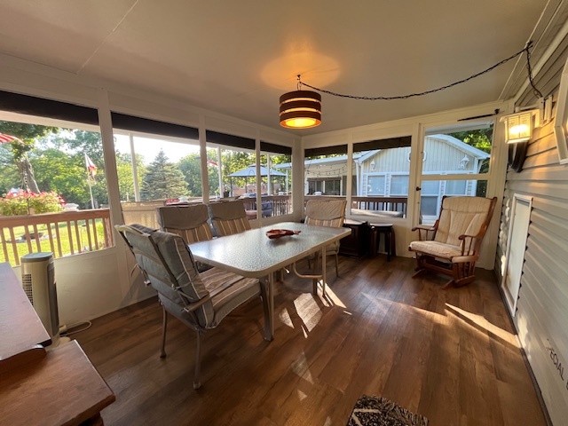 2795 East 28th Road Marseilles, IL 61341 - Photo 29 of 79 a view of a dining room with furniture window and wooden floor