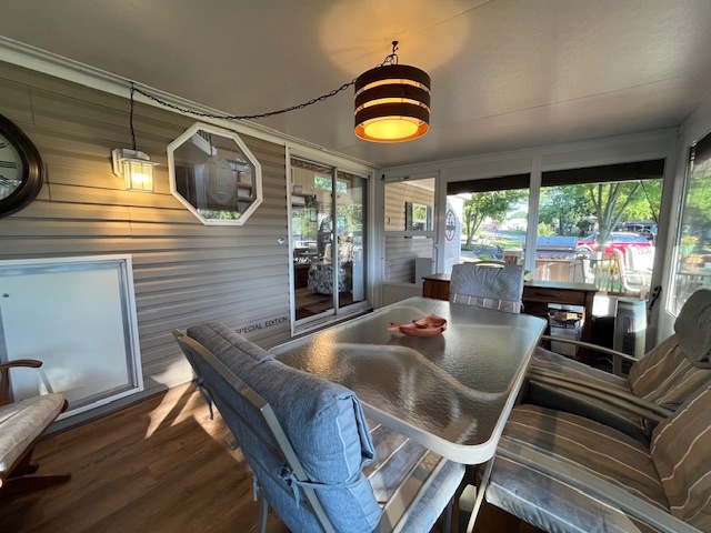 2795 East 28th Road Marseilles, IL 61341 - Photo 30 of 79 a view of a dining room with furniture wooden floor and chandelier