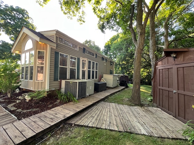 2795 East 28th Road Marseilles, IL 61341 - Photo 33 of 79 a view of backyard with deck and wooden floor