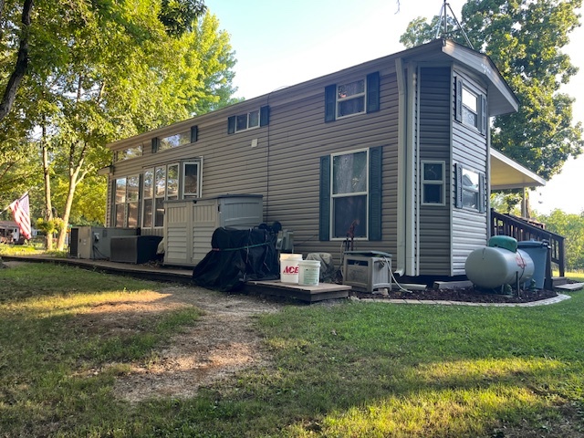 2795 East 28th Road Marseilles, IL 61341 - Photo 34 of 79 a view of a house with backyard and sitting area
