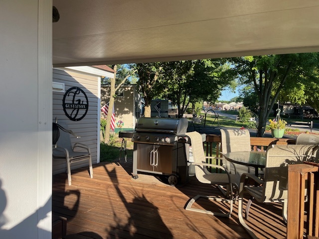 2795 East 28th Road Marseilles, IL 61341 - Photo 38 of 79 a dining room with furniture and a floor to ceiling window