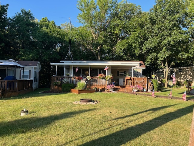 2795 East 28th Road Marseilles, IL 61341 - Photo 4 of 79 a view of a house with swimming pool and sitting area