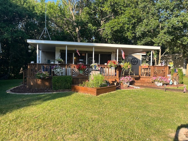 2795 East 28th Road Marseilles, IL 61341 - Photo 5 of 79 a view of a house with backyard porch and furniture