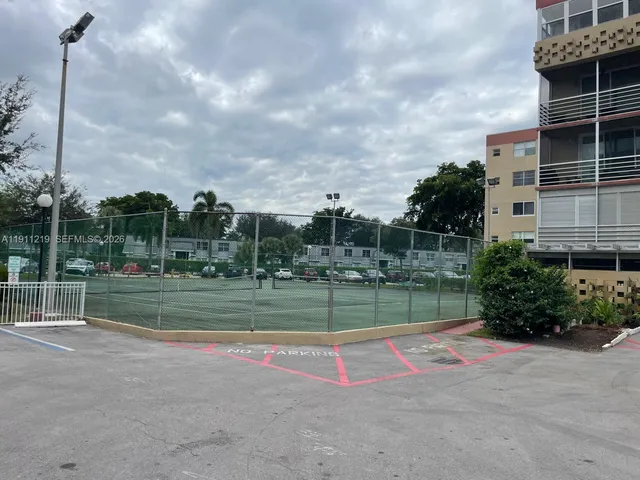 a view of a patio with couches and potted plants