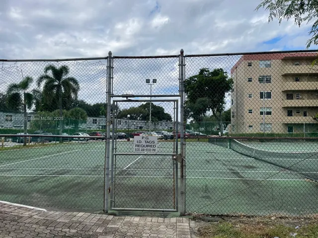 a swimming pool with outdoor seating and yard