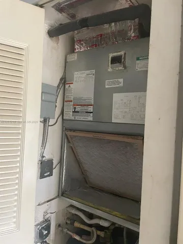 a view of storage and utility room with a sink