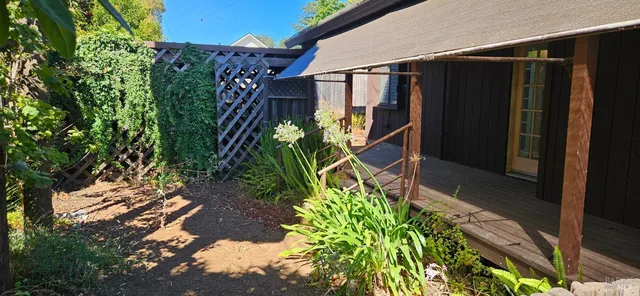 a backyard of a house with lots of green space