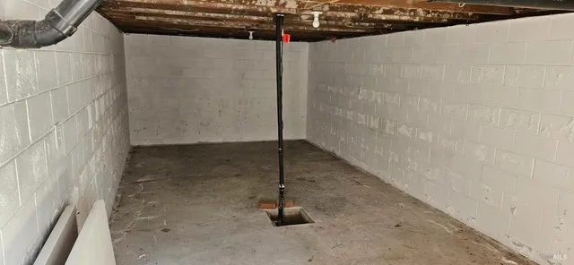 view of a room with rack and wooden floor