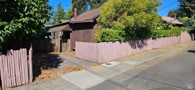 a view of swimming pool with a backyard