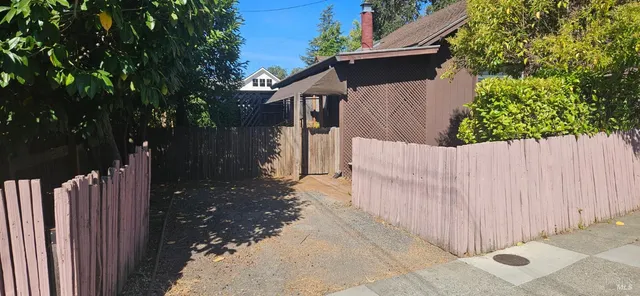 a view of balcony and yard