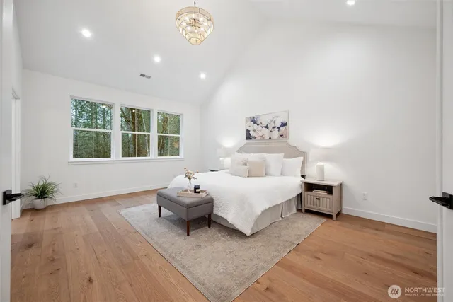 a living room with furniture and windows