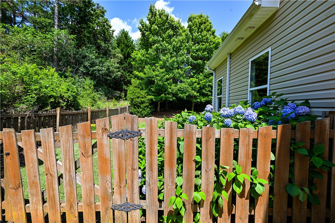 109 Ridgestone Drive Central, SC 29630 - Photo 6 of 42 Fenced backyard with established landscape.