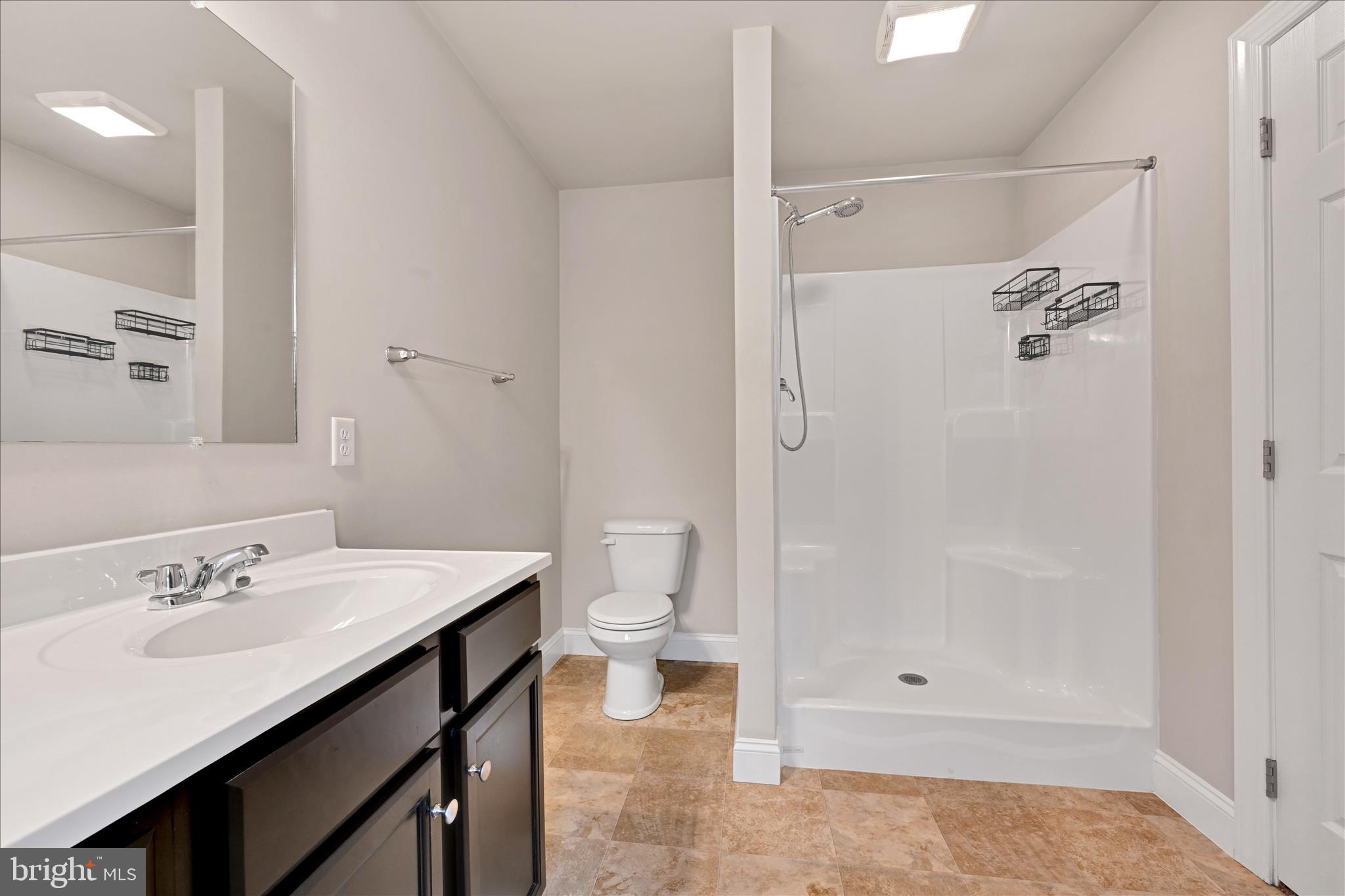 362 Cedar Hollow Manheim, PA 17545 - Photo 20 of 34 a bathroom with a sink a toilet and shower