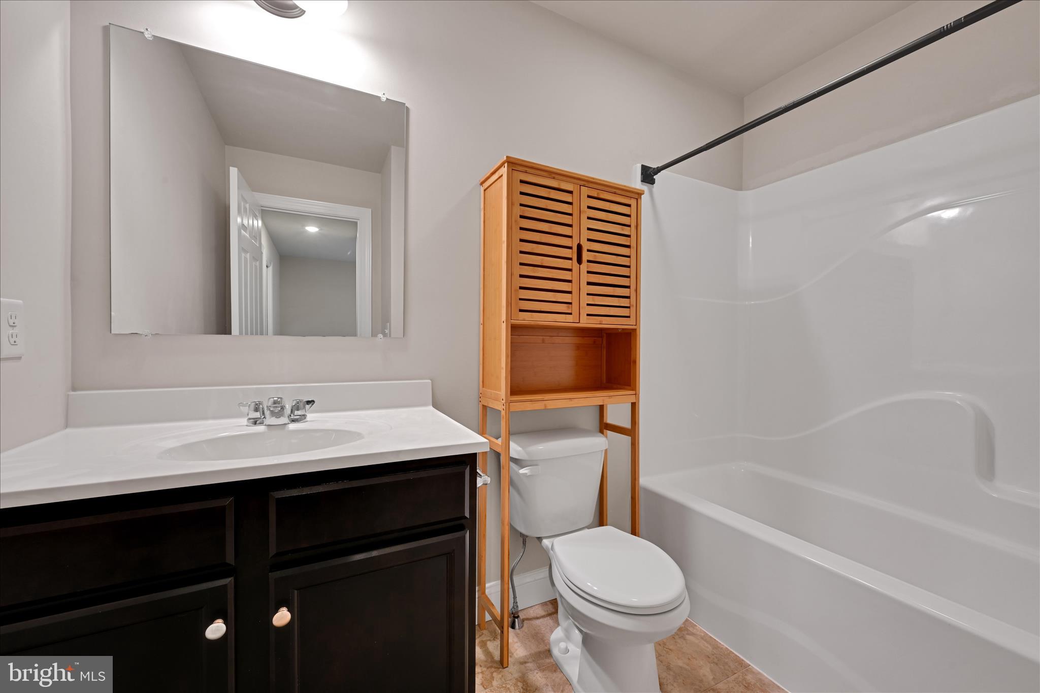 362 Cedar Hollow Manheim, PA 17545 - Photo 26 of 34 a bathroom with a sink toilet and shower