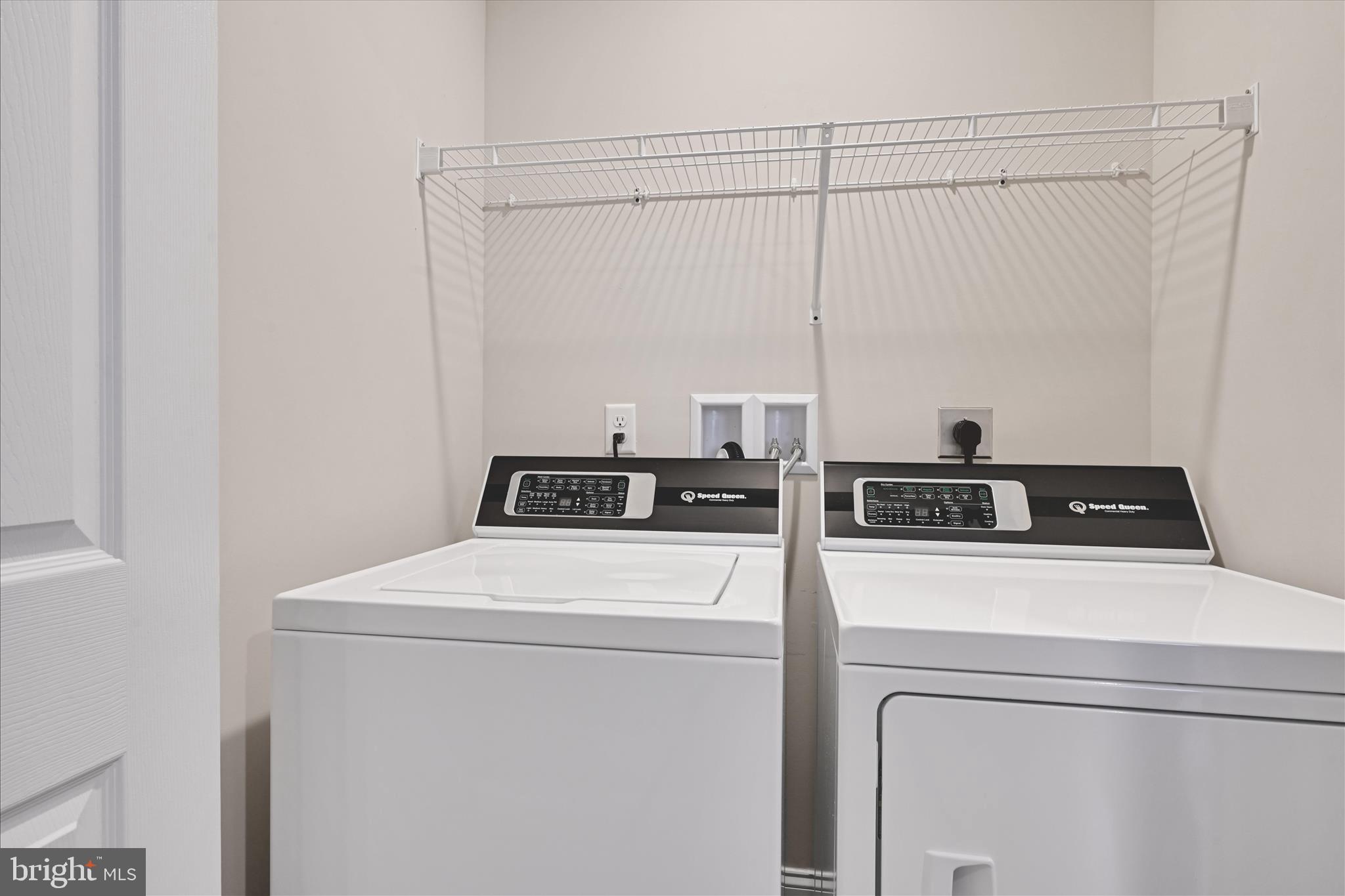 362 Cedar Hollow Manheim, PA 17545 - Photo 27 of 34 a close up view of washer and dryer with wooden floor