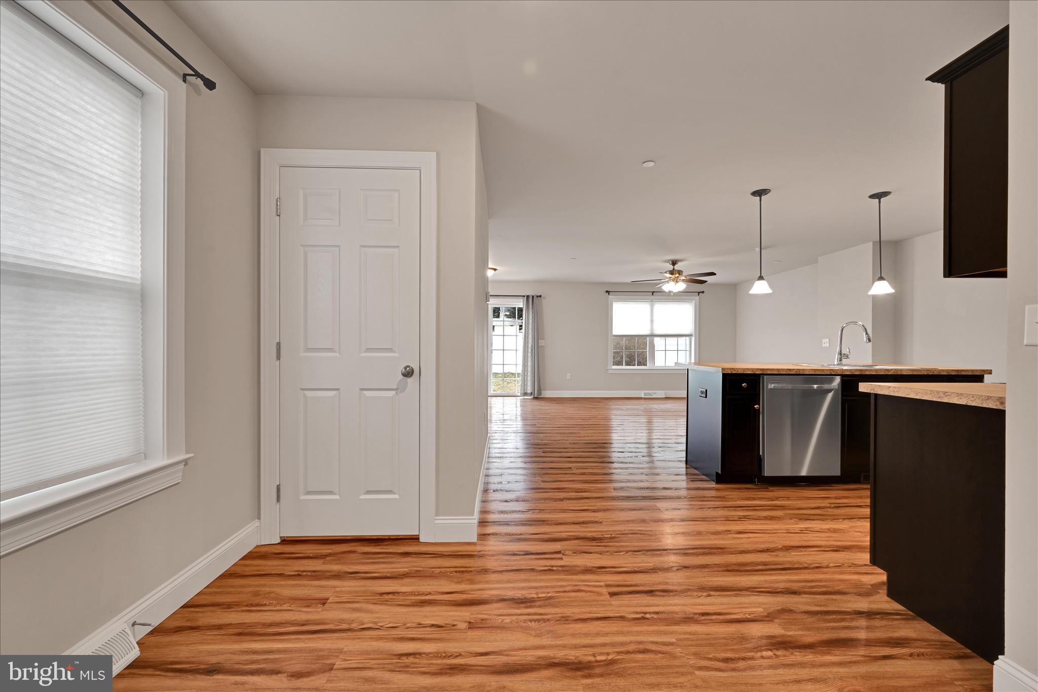 362 Cedar Hollow Manheim, PA 17545 - Photo 6 of 34 a kitchen view with wooden floor and a refrigerator