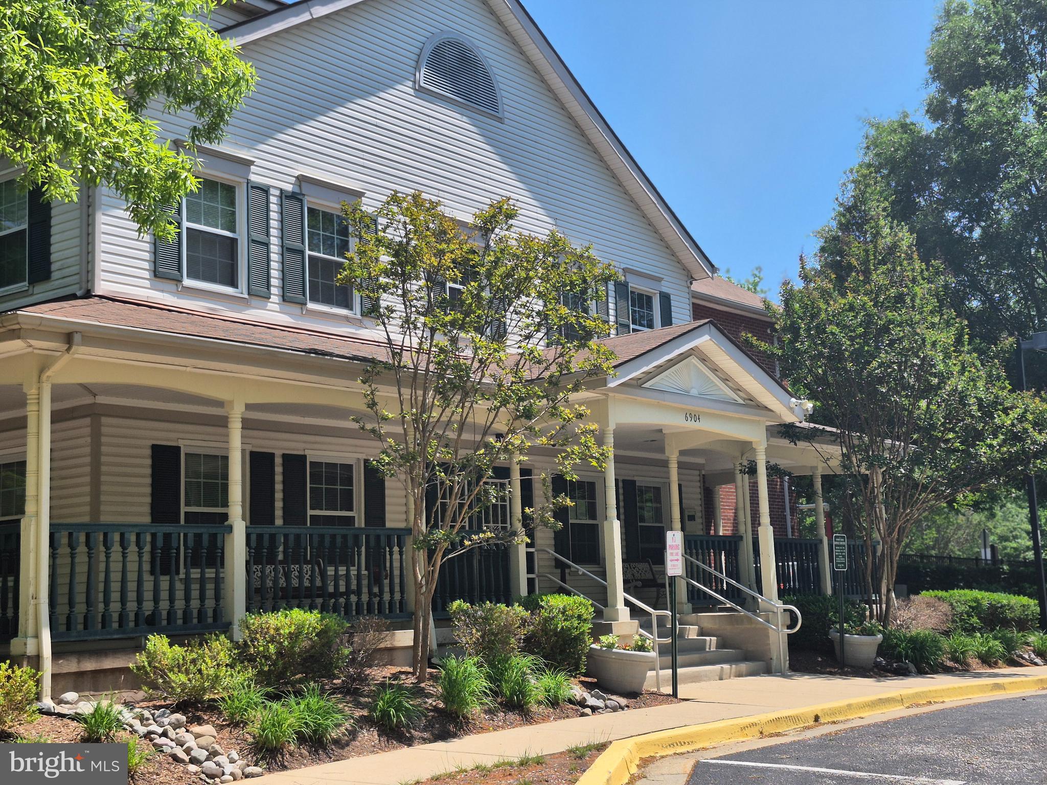 7006 Chain Fern Court Clinton, MD 20735 - Photo 11 of 23 a front view of a house with garden