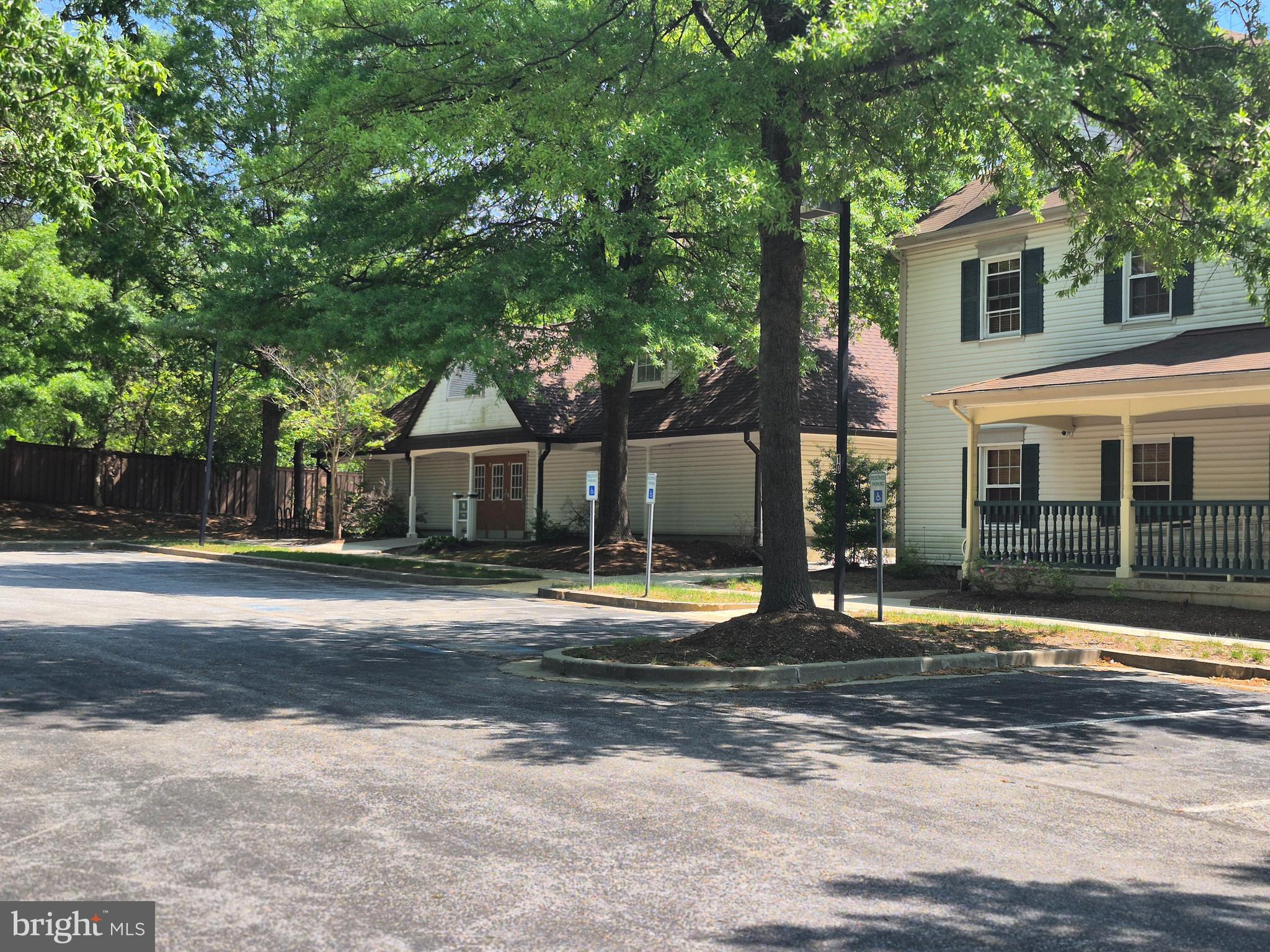 7006 Chain Fern Court Clinton, MD 20735 - Photo 12 of 23 a front view of a house with a yard