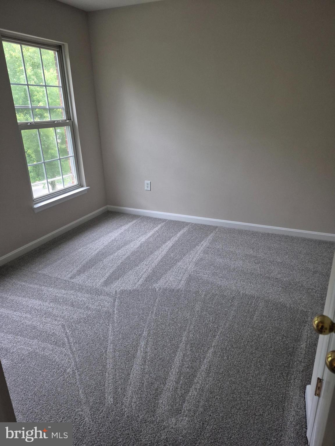 7006 Chain Fern Court Clinton, MD 20735 - Photo 19 of 23 an empty room with windows