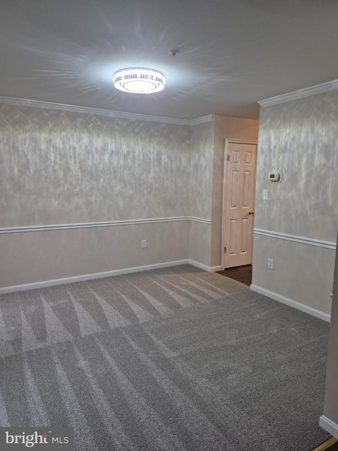 7006 Chain Fern Court Clinton, MD 20735 - Photo 4 of 23 a view of an empty room