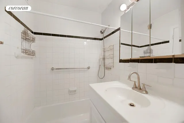 a bathroom with a sink and a shower
