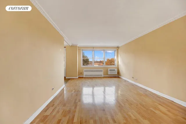 a view of a storage & utility room with wooden floor