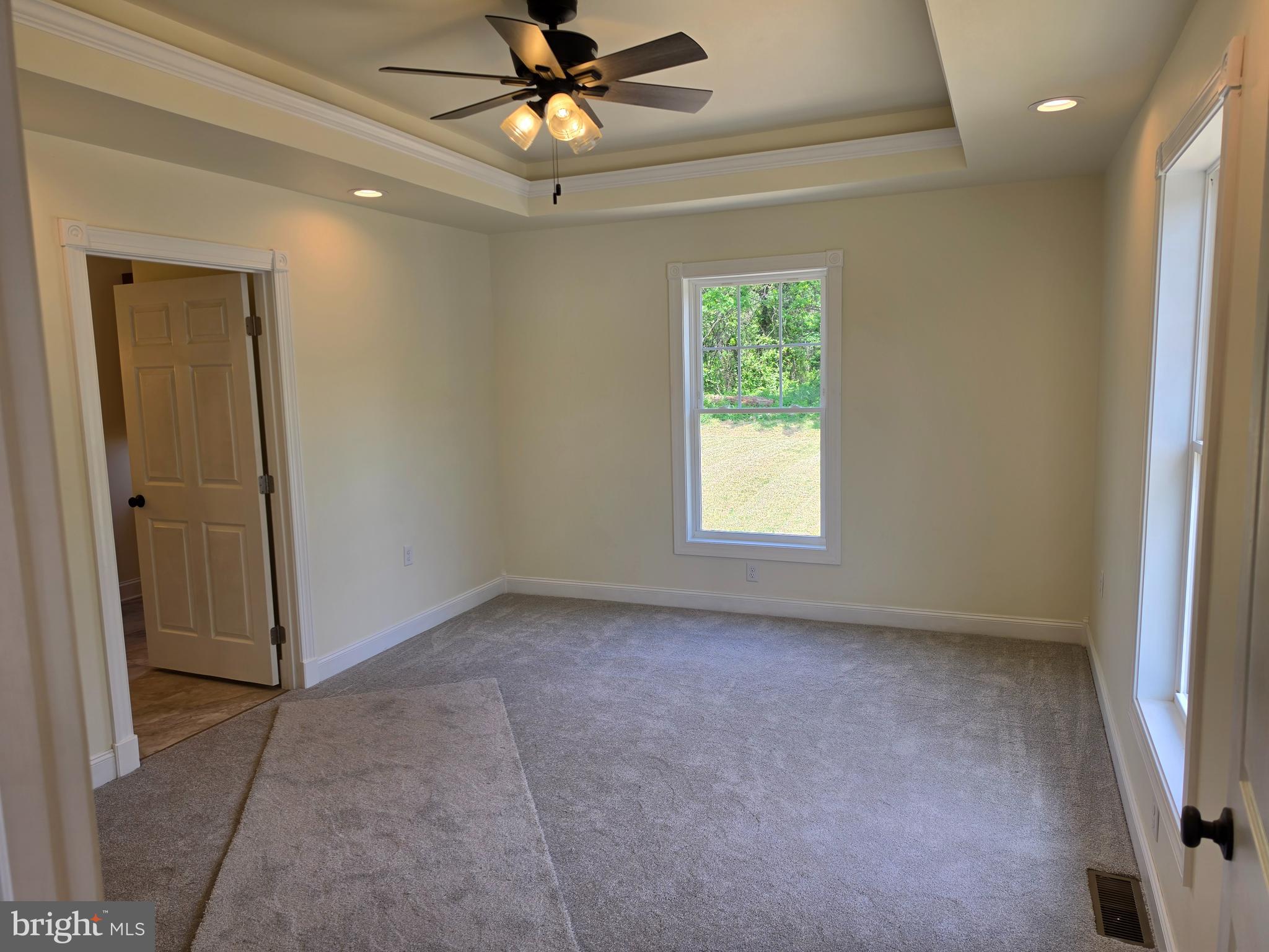 13514 Old Cresaptown Road Southwest Lavale, MD 21502 - Photo 12 of 25 an empty room with a window and a fan