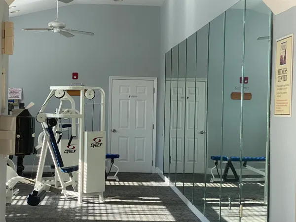 a view of a room with gym equipment