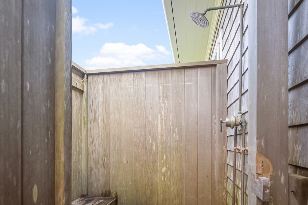 75 Baxter Road Nantucket, MA 02554 - Photo 19 of 24 a close up of a shower curtain