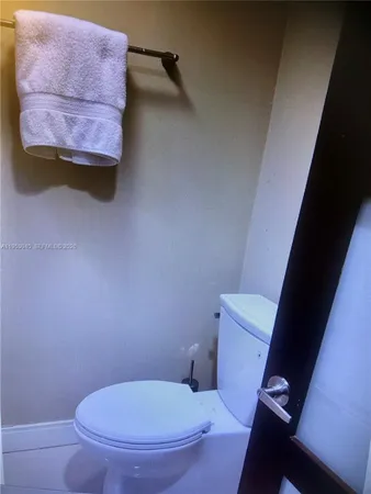 a bathroom with a toilet and a sink