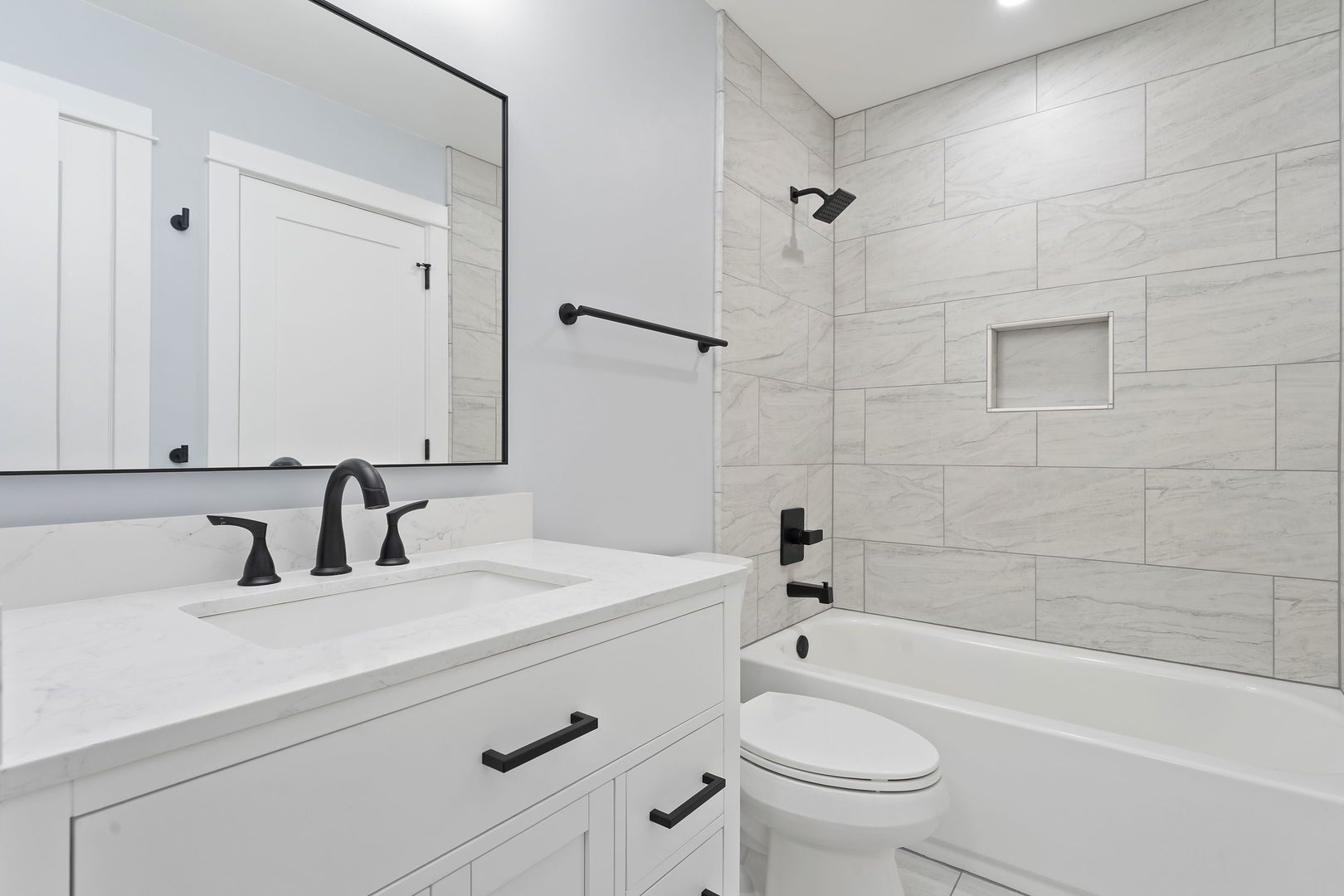 1615 North Vine Street Chicago, IL 60614 - Photo 16 of 25 a bathroom with a sink a toilet and a mirror