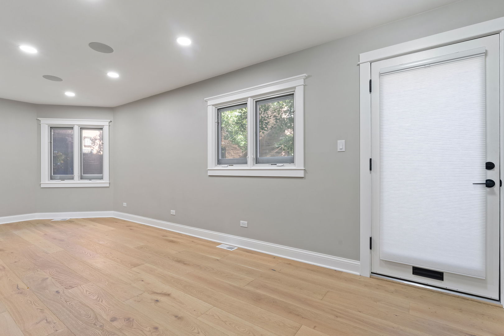1615 North Vine Street Chicago, IL 60614 - Photo 2 of 25 a view of an empty room with wooden floor and a window