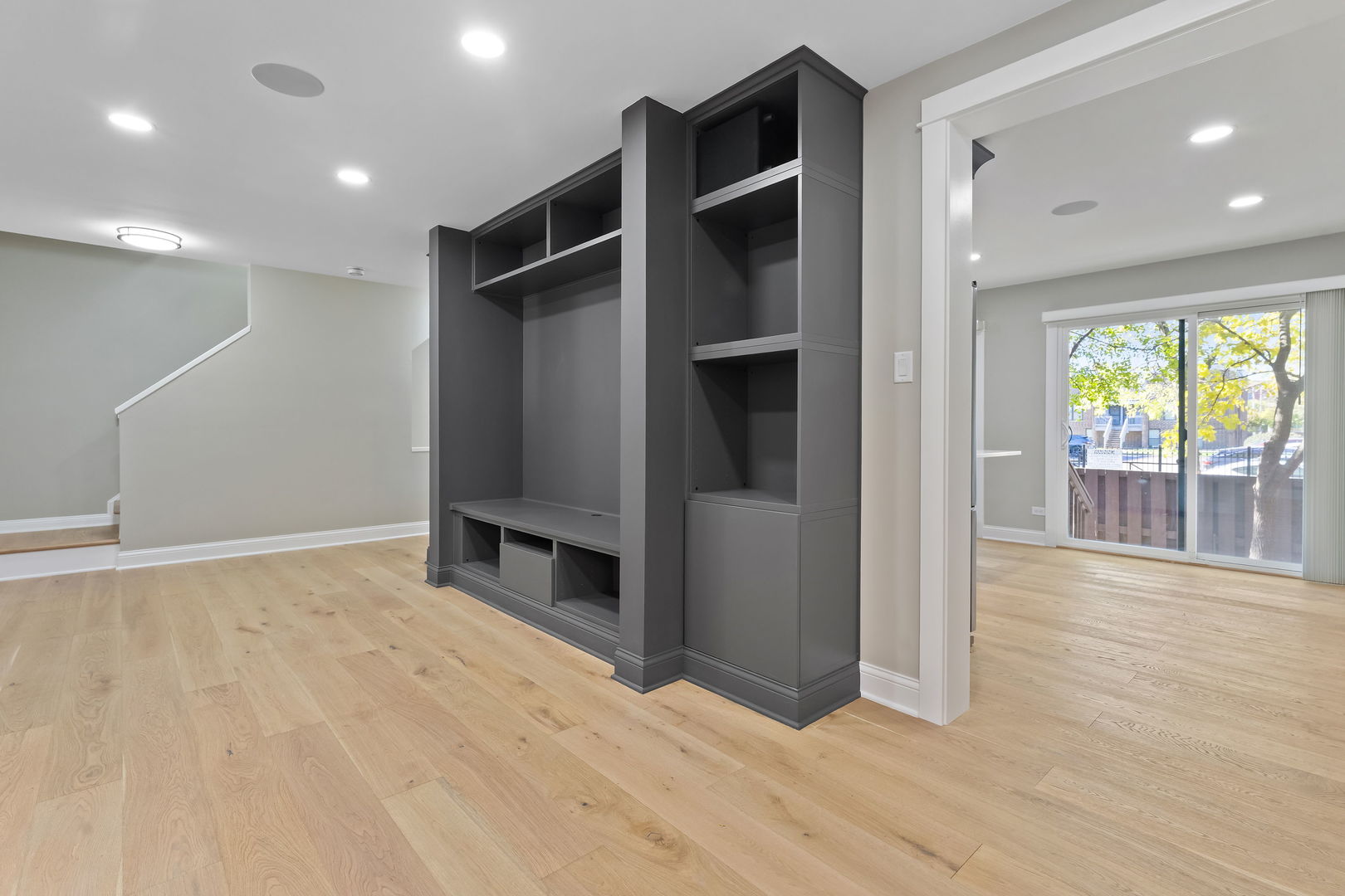 1615 North Vine Street Chicago, IL 60614 - Photo 6 of 25 an empty room with wooden floor and windows