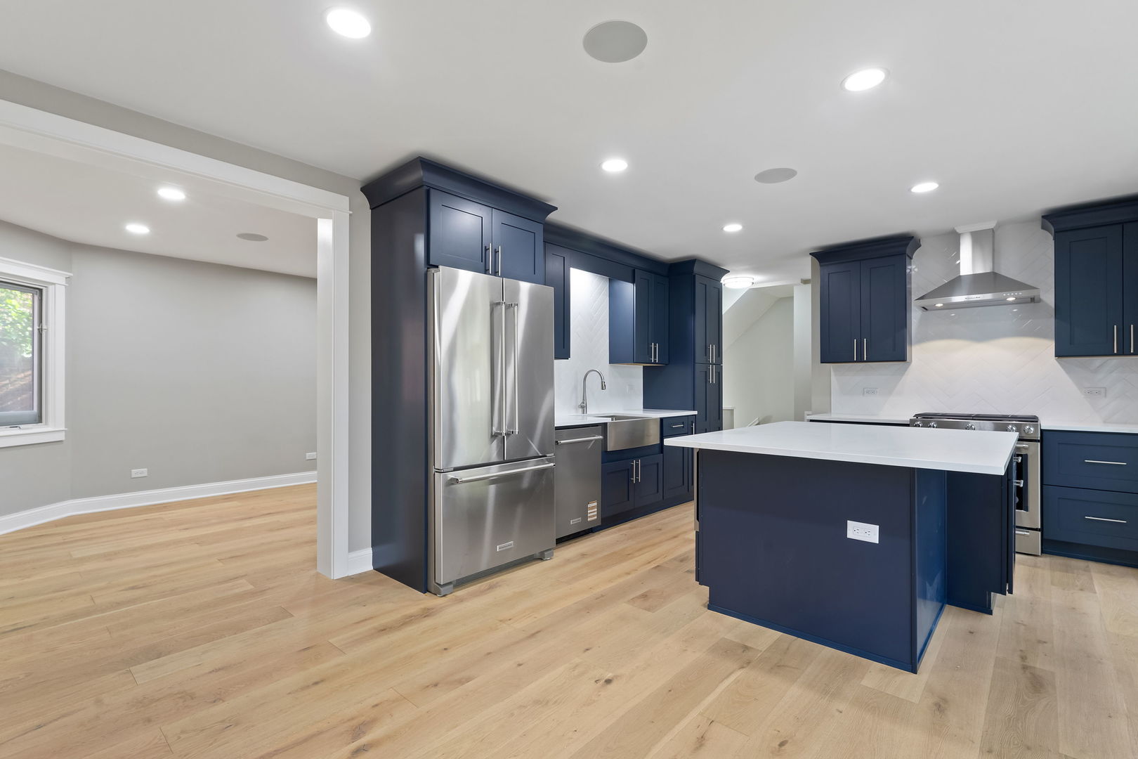 1615 North Vine Street Chicago, IL 60614 - Photo 8 of 25 a kitchen with stainless steel appliances granite countertop a refrigerator and a stove