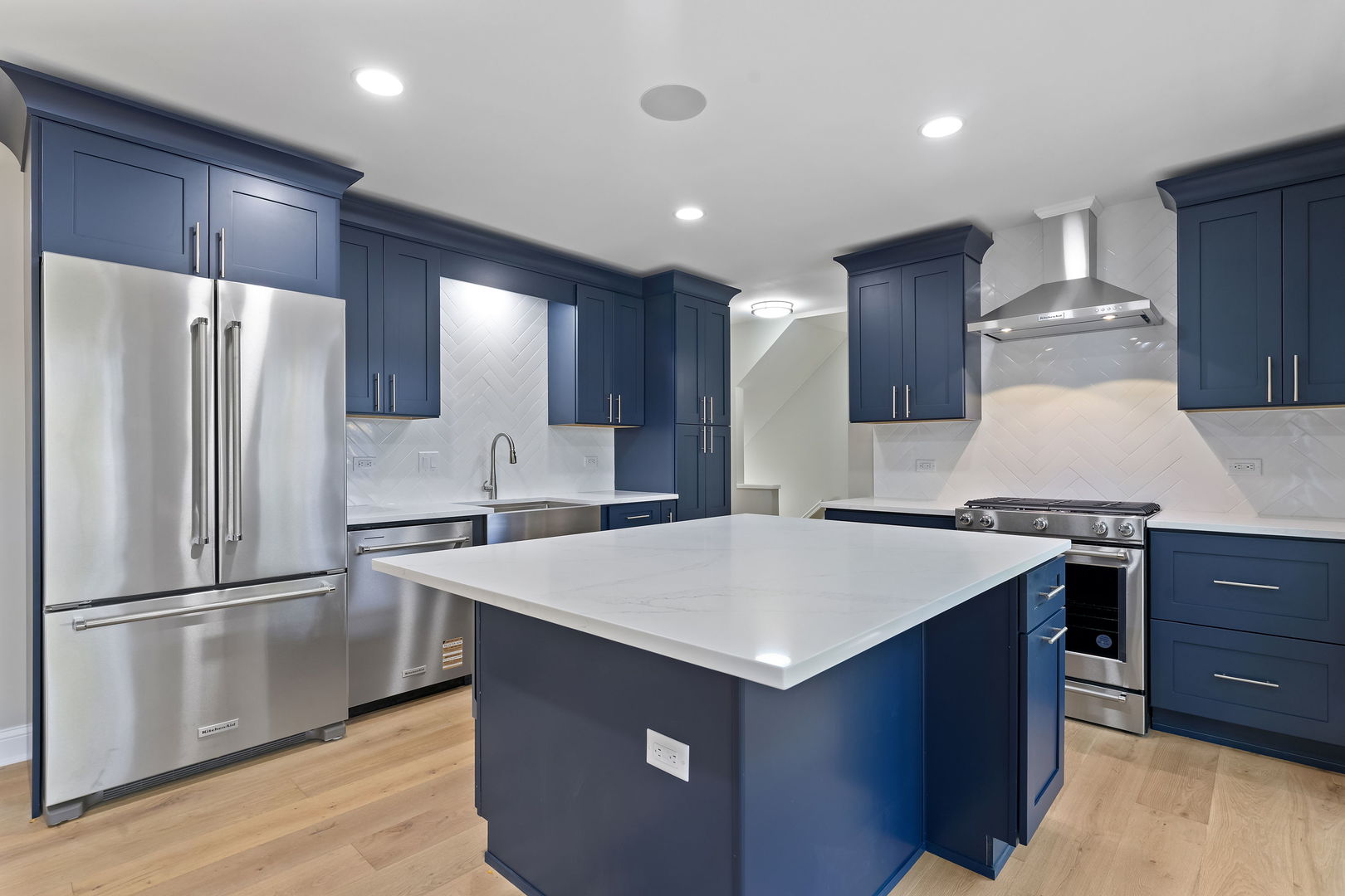 1615 North Vine Street Chicago, IL 60614 - Photo 9 of 25 a kitchen with stainless steel appliances a refrigerator and a stove