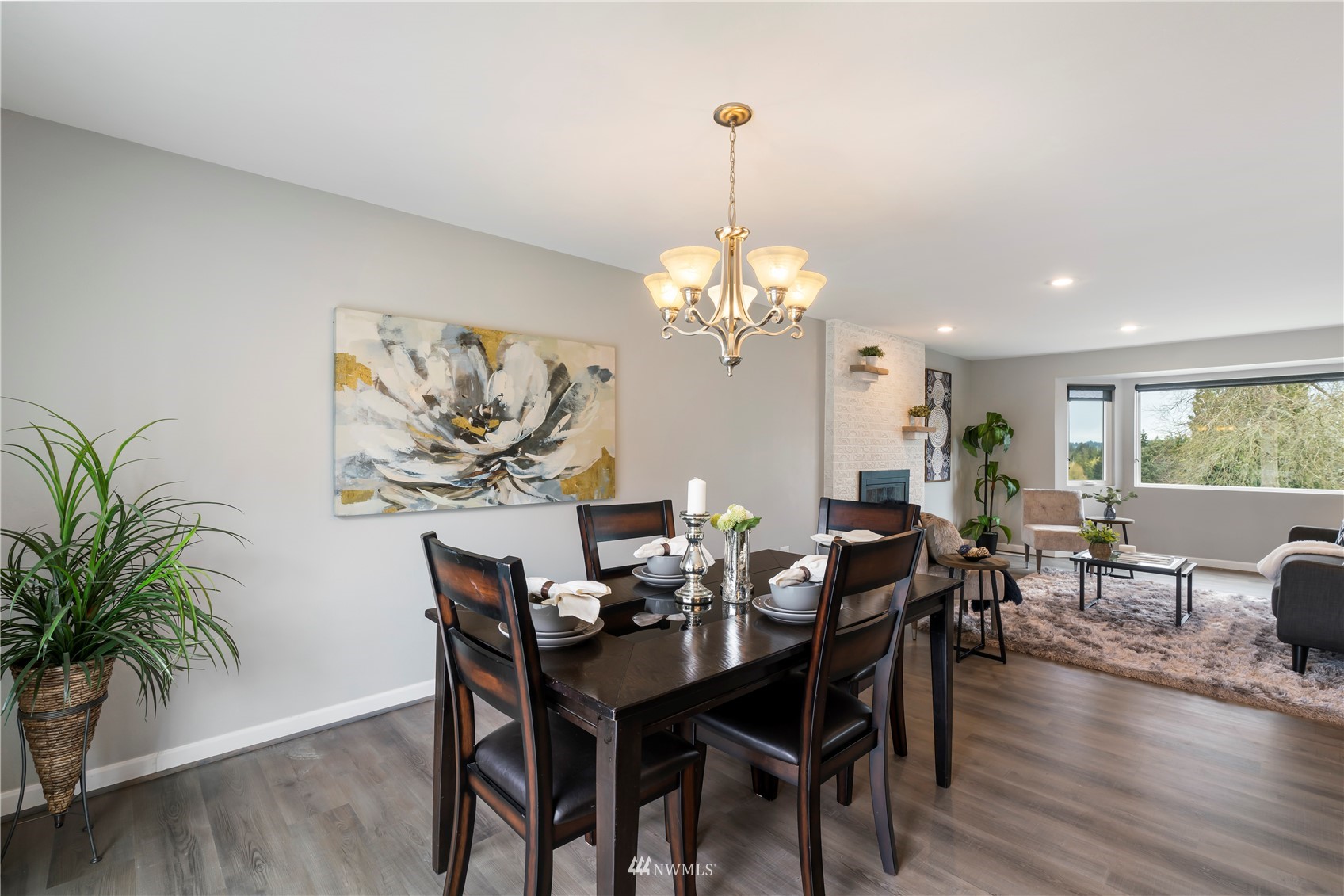 20104 103rd Place Northeast Bothell, WA 98011 - Photo 12 of 40 a view of a dining room with furniture wooden floor and chandelier