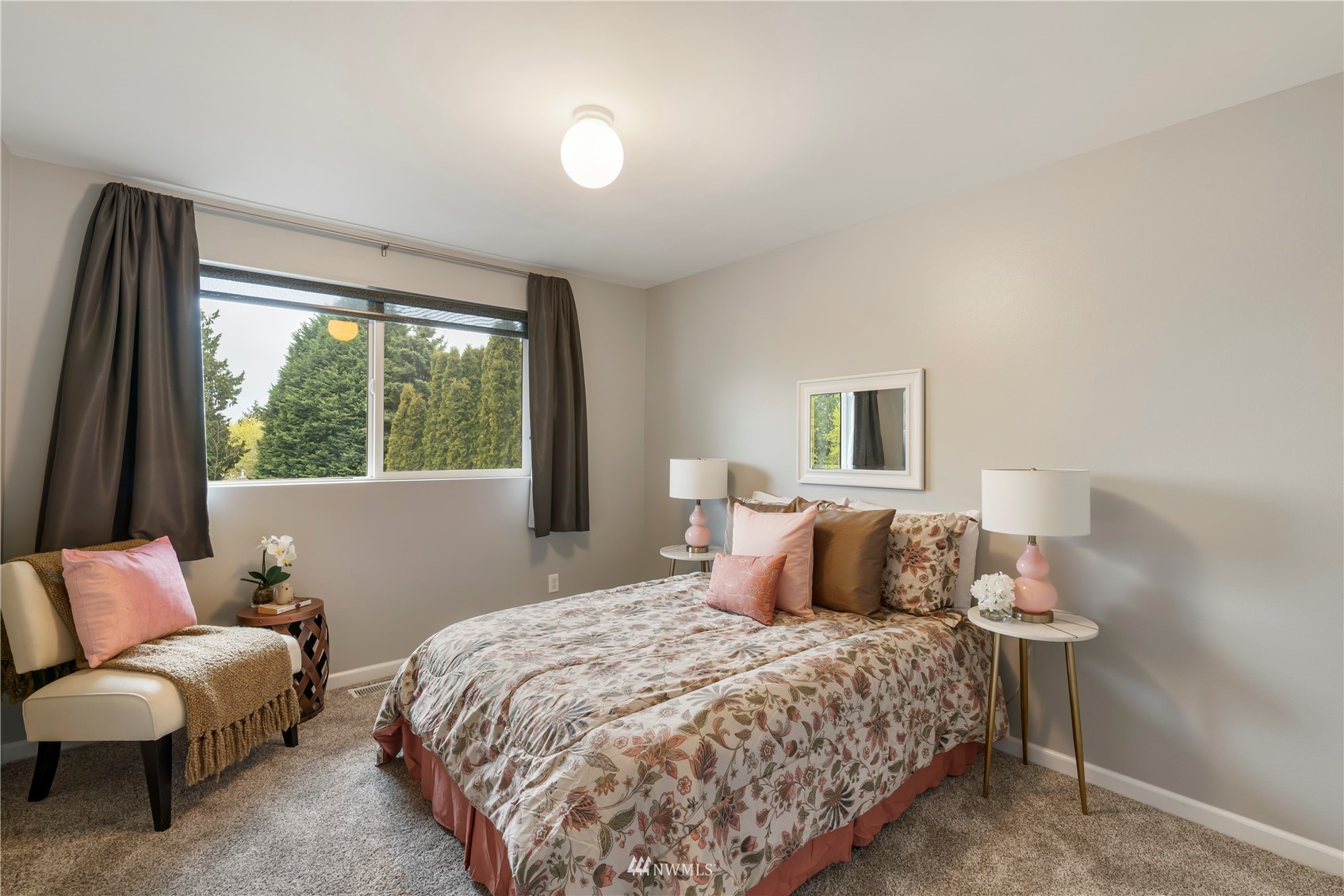 20104 103rd Place Northeast Bothell, WA 98011 - Photo 22 of 40 a bedroom with a bed and a large window