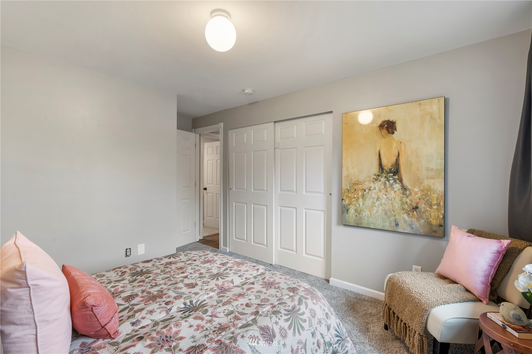 20104 103rd Place Northeast Bothell, WA 98011 - Photo 23 of 40 a bedroom with a bed and couch