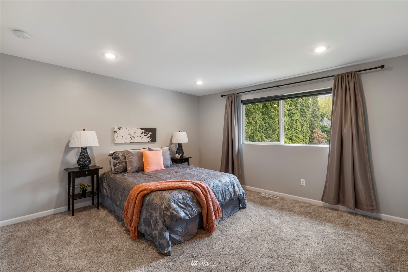 20104 103rd Place Northeast Bothell, WA 98011 - Photo 27 of 40 a bedroom with a bed and a window