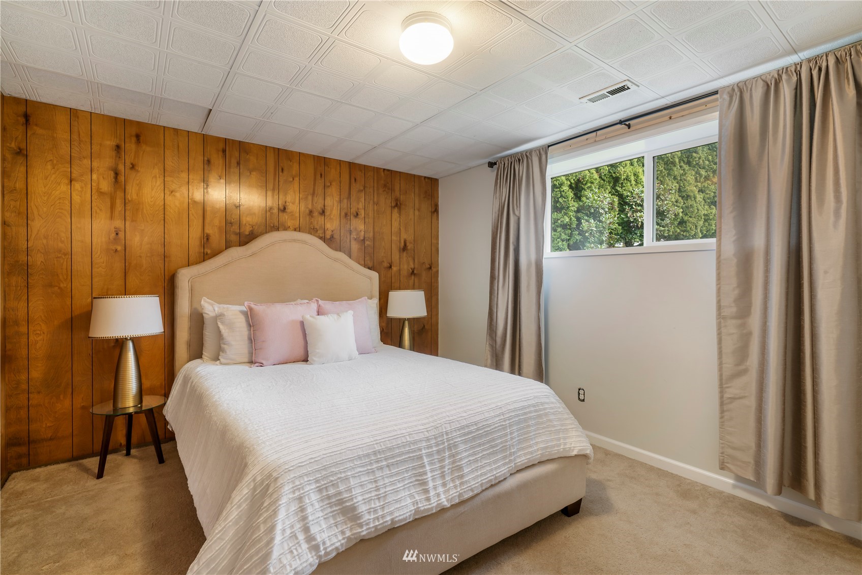 20104 103rd Place Northeast Bothell, WA 98011 - Photo 35 of 40 a bedroom with a large bed and a window