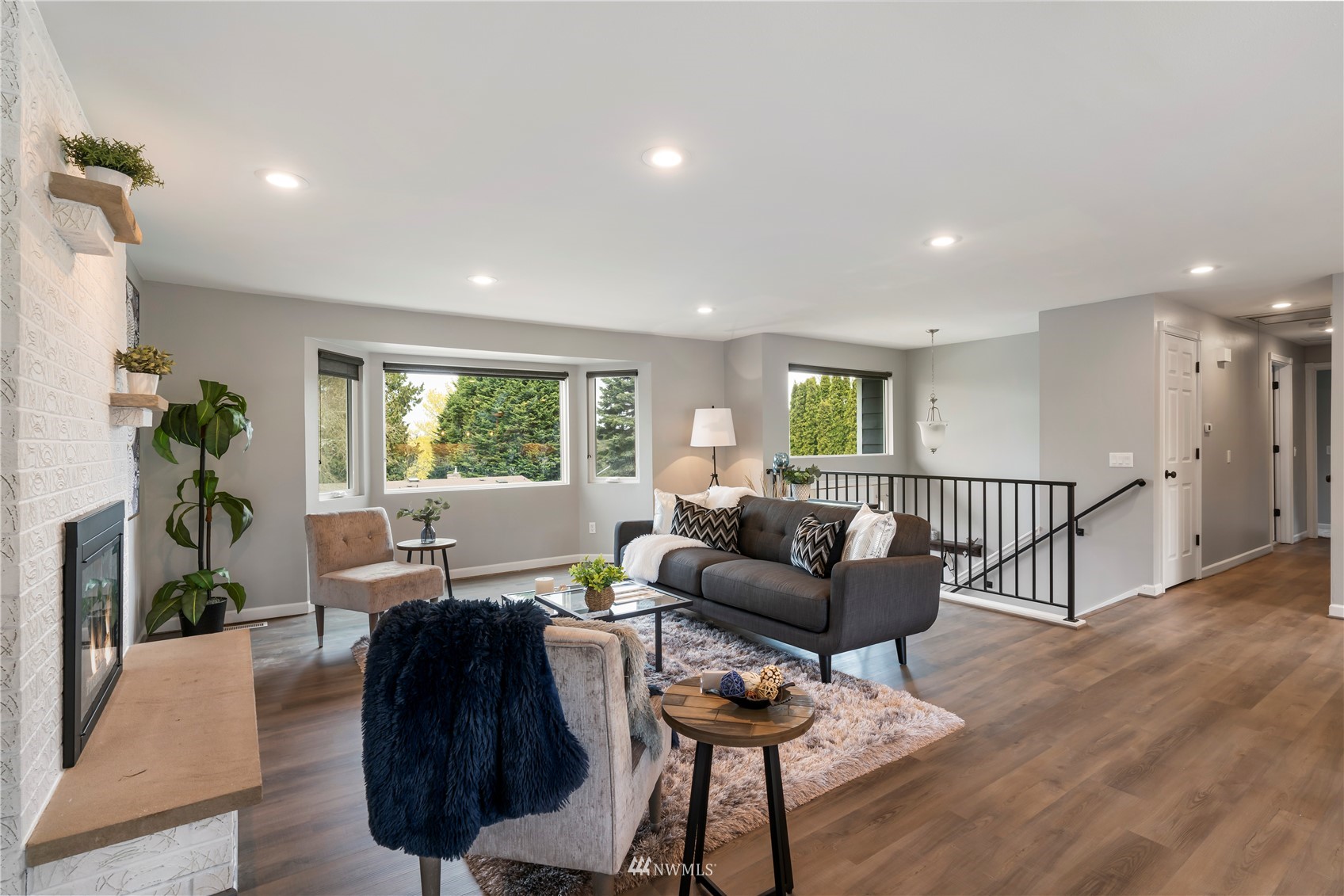 20104 103rd Place Northeast Bothell, WA 98011 - Photo 4 of 40 a living room with furniture and wooden floor