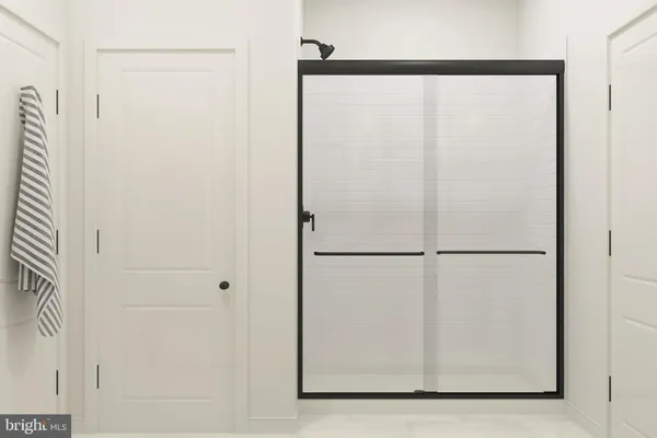 a white refrigerator freezer and a picture of door