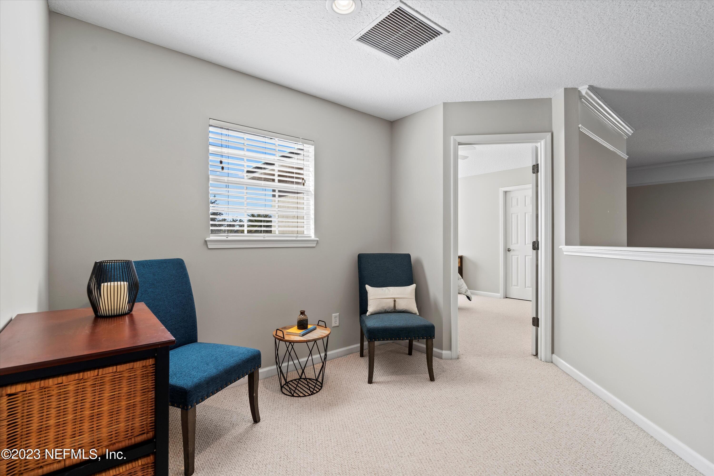 618 Racoon Court St. Johns, FL 32259 - Photo 23 of 61 a living room with furniture and a window