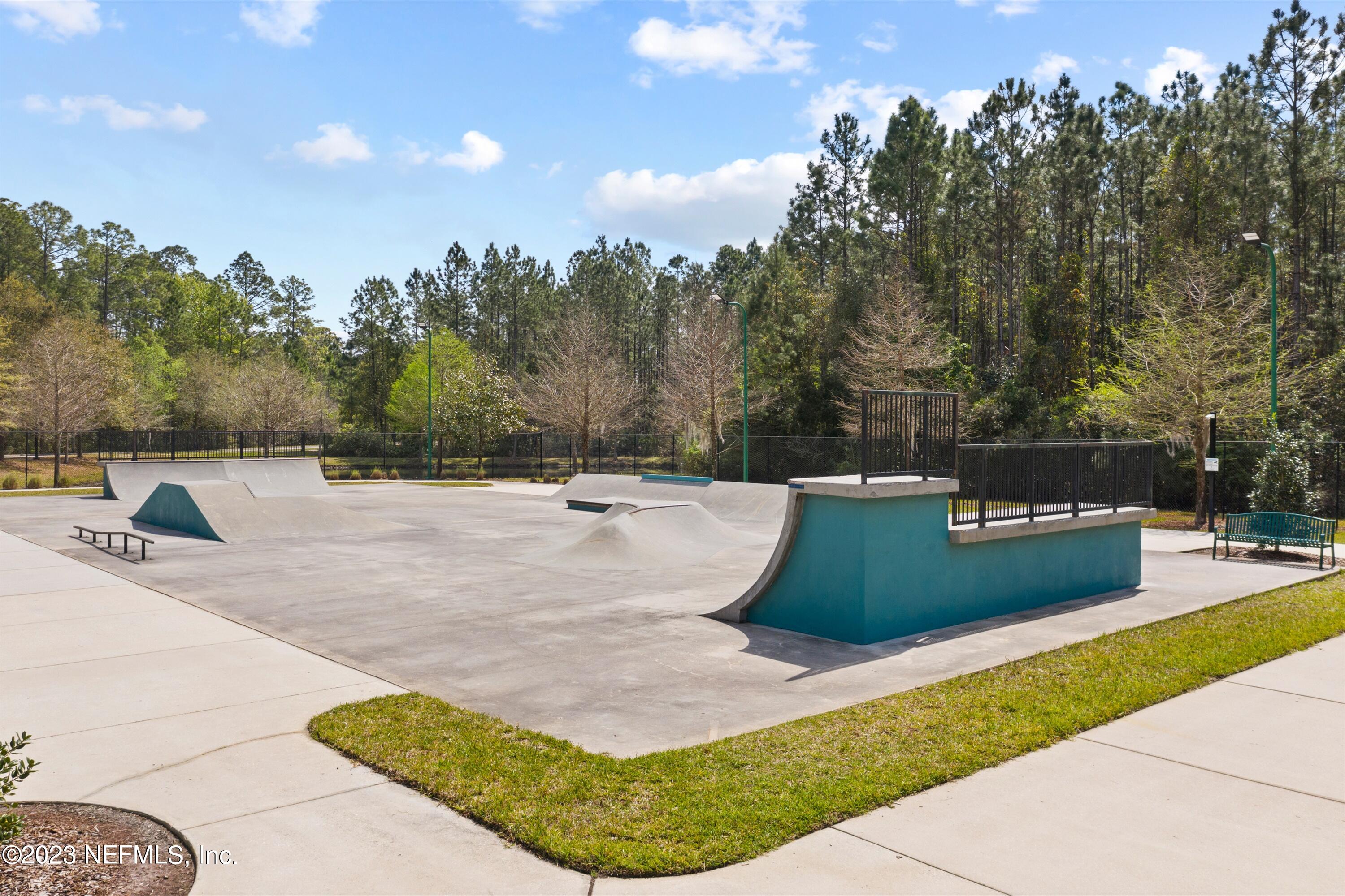 618 Racoon Court St. Johns, FL 32259 - Photo 44 of 61 a view of a swimming pool with a patio
