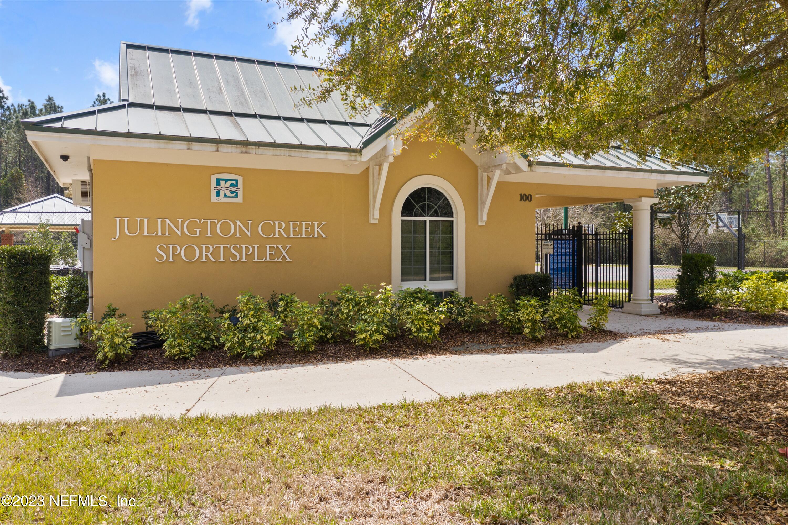 618 Racoon Court St. Johns, FL 32259 - Photo 45 of 61 a front view of a house with garden