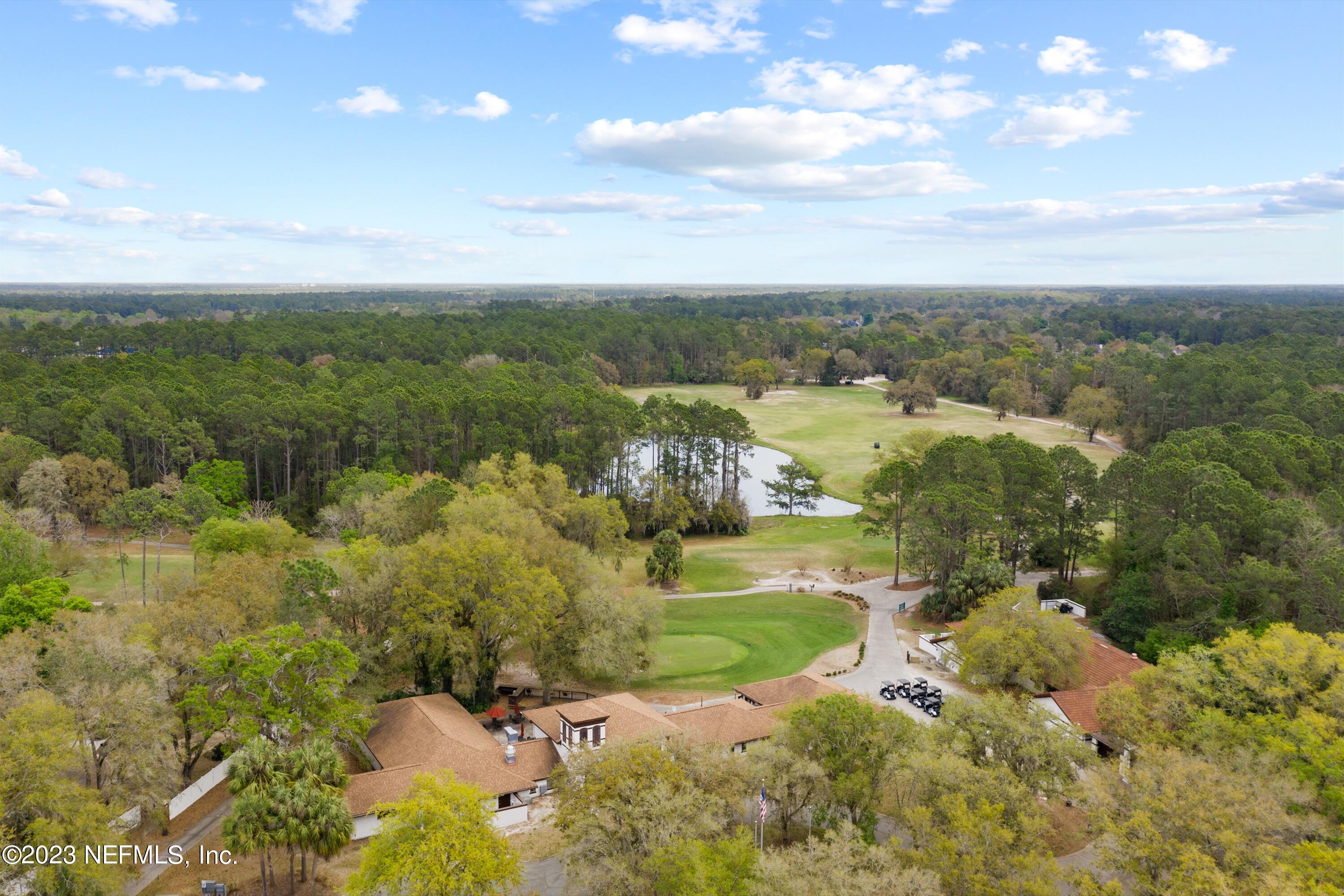 618 Racoon Court St. Johns, FL 32259 - Photo 59 of 61 a view of a lake with a mountain